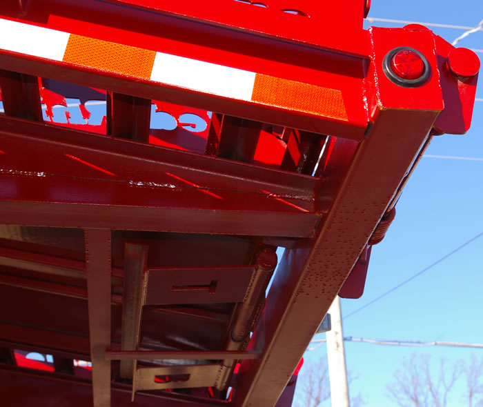 Rear bumper and side rails constructed of rectangular tubing.  Adds strength without adding much weight.  Protects the light connections from mud, snow and ice